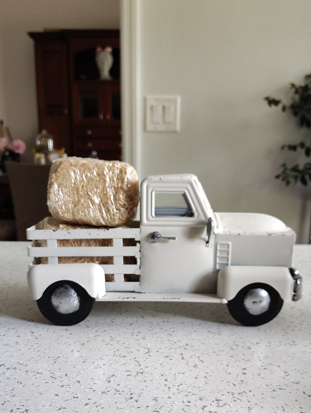 White Decorative Vintage Pickup Truck with Hay Bale